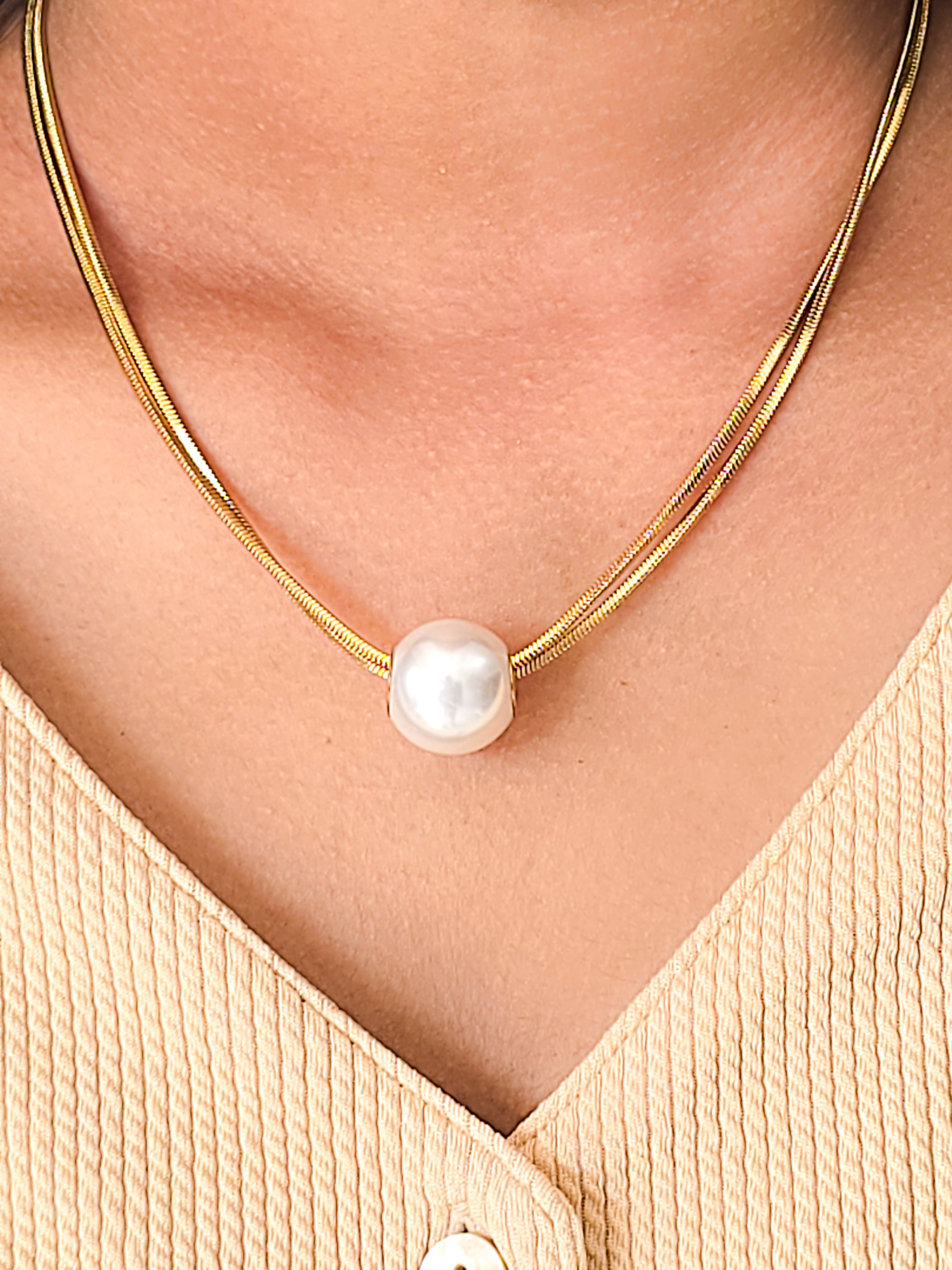 Model wearing aurora pearl gold plated necklace for women with timeless elegant by Rayona India