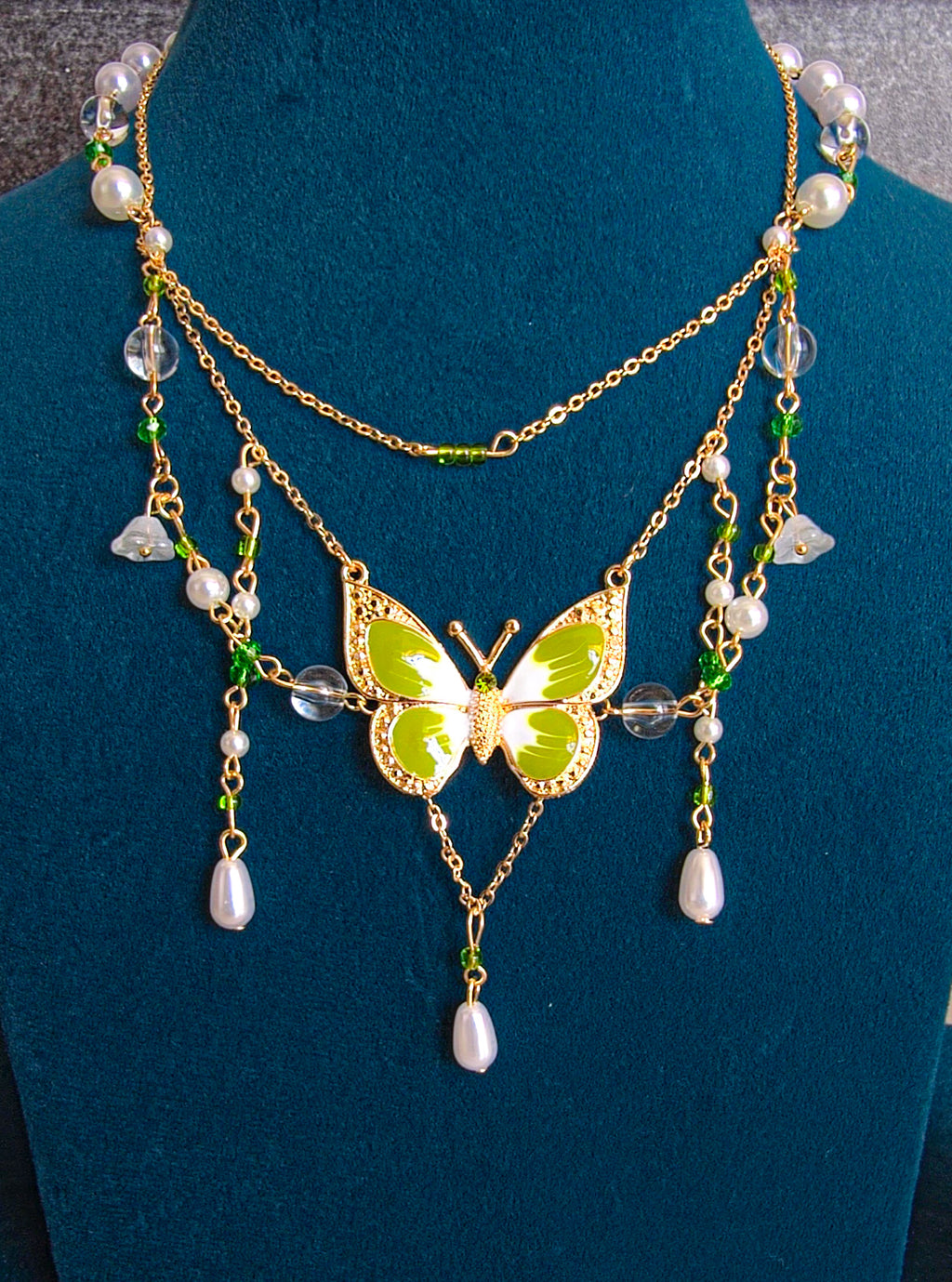 close up of Garden Butterfly Pearl Choker Necklace with multi layer butterfly designed for women with gold coating by Rayona India 