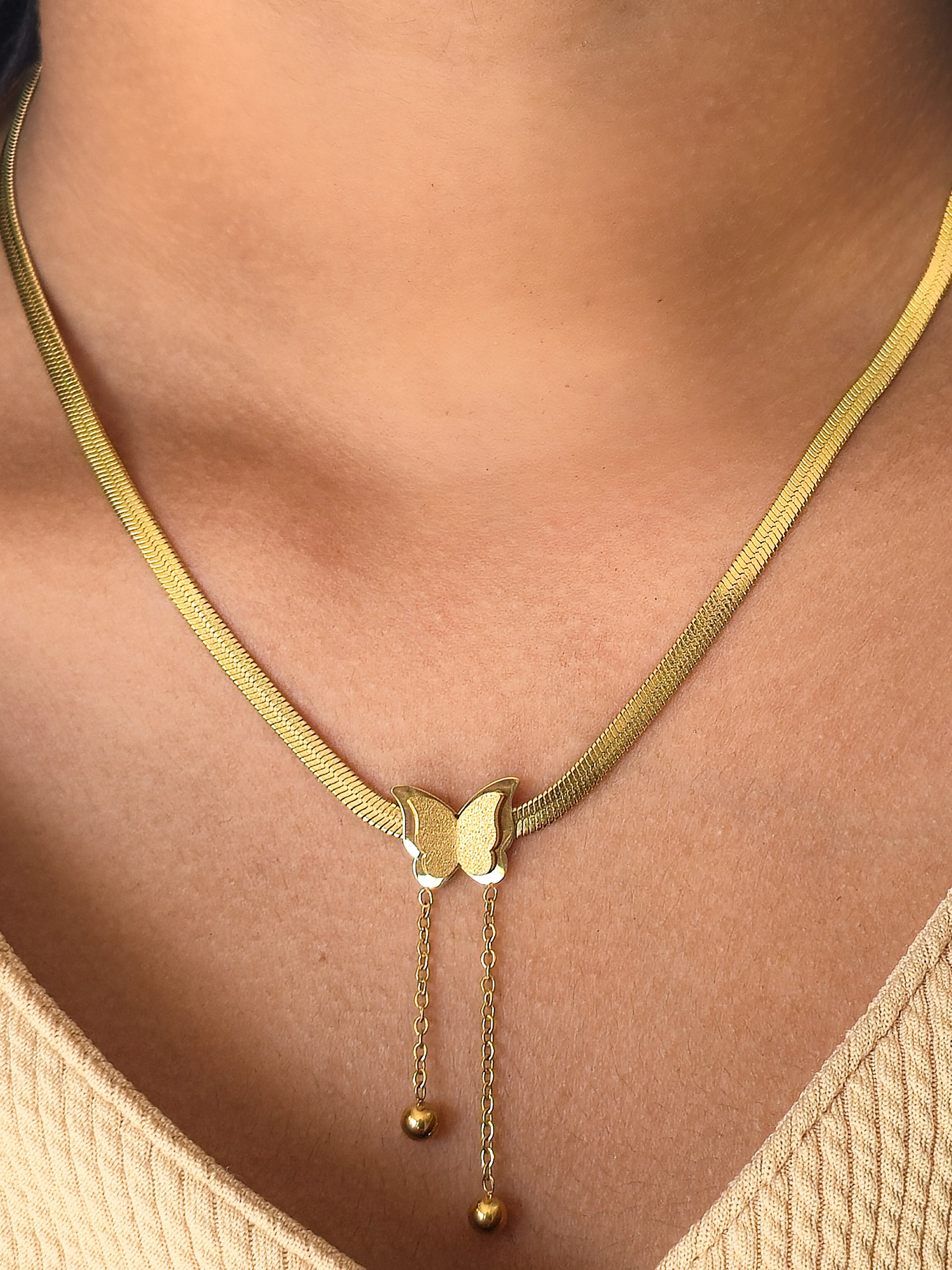 Model wearing Twin Wings Butterfly Gold Necklace – feminine elegant jewellery for women by Rayona India